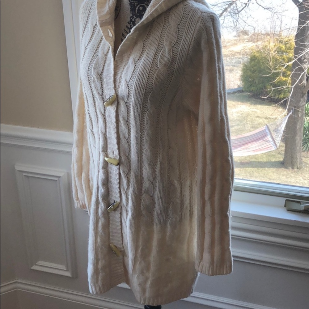 Long cable sweater